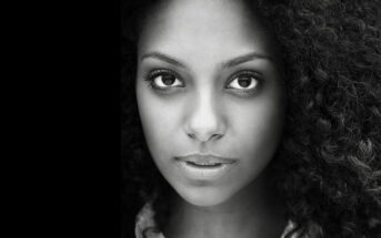 African American woman in black and white looking at camera - emotional self-care