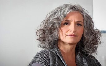 middle aged woman with gray hair illustrating wisdom and intelligence