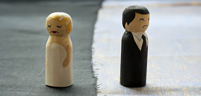 bride and groom figures looking unhappy illustrating it's time to divorce