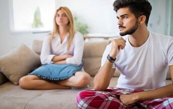 woman looking at boyfriend with suspicion and jealousy