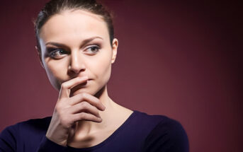 pensive woman thinking about her mistakes so that she may learn from them