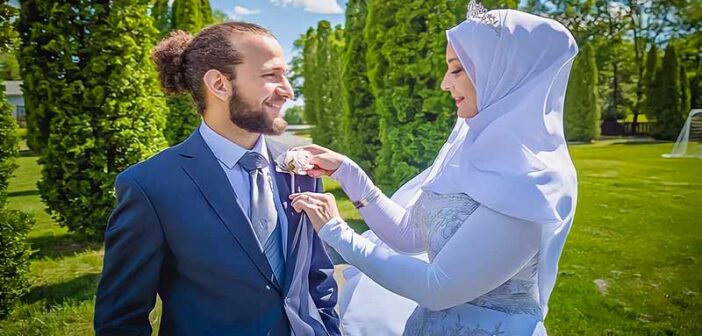 wedding of a woman in Muslim dress and a non-Muslim man