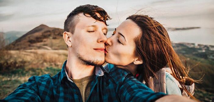 couple sharing tender kiss illustrating getting the spark back in a relationship