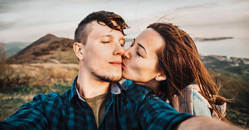 couple sharing tender kiss illustrating getting the spark back in a relationship