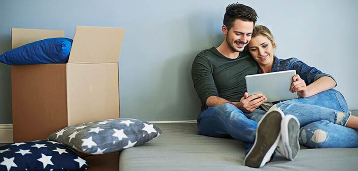 young couple who have just moved in together illustrating cohabitation before marriage