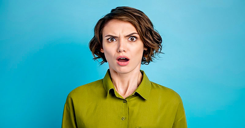 woman looking confused and ditzy - illustrating being scatterbrained