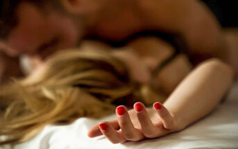 blurred photo of couple in bed