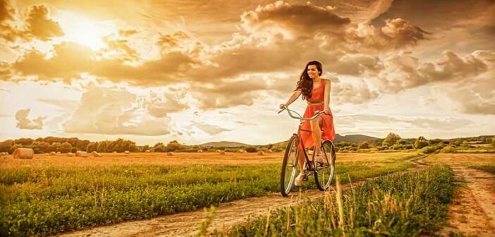 woman riding bike and being independent of her relationship