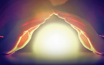 hands covering glowing orb of light - illustrating protection from negative energy