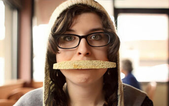 weird woman with fruit peel over her mouth