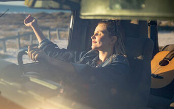 woman sitting in car enjoying sun - making every day count