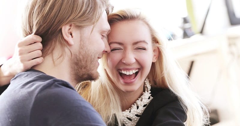 couple laughing and smiling