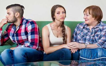 couple sitting on couch with mother-in-law