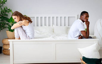 couple on bed not talking with neither of them feeling heard
