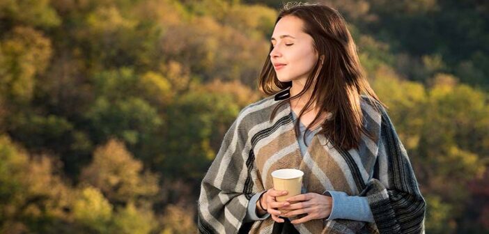 young woman in nature changing her outlook on life