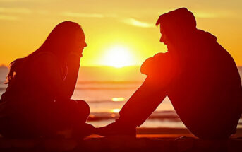 boy and girl talking with sunset in background - illustrating a guy opening up