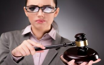 woman with gavel - illustrating judgmental people