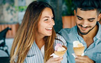 guy and girl eating ice cream on a second date