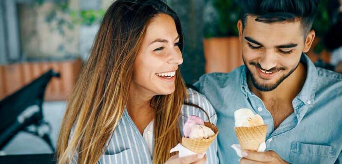 guy and girl eating ice cream on a second date