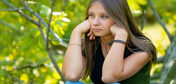 depressed looking young woman who thinks she has nothing to look forward to