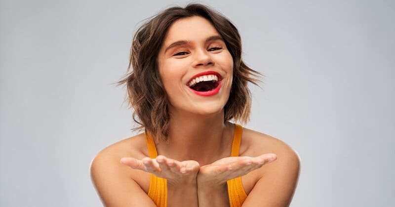 joyful smiling woman who is happy with her life