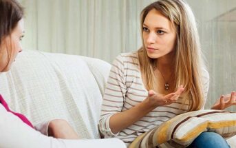 young woman venting to her friend