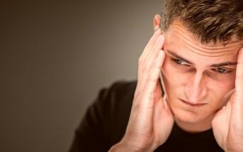 emotional constipation - man looking stressed by keeping his emotions in