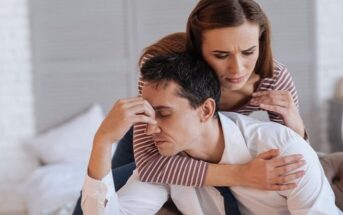 woman trying to comfort stressed partner - illustrating letting your partner's moods affect you