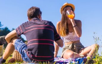 dry dating while sober - man and woman having picnic date with orange juice