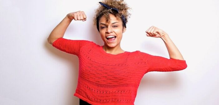 take your power back - woman flexing muscles