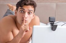shirtless man doing shush pose with his finger illustrating a red flag for online dating
