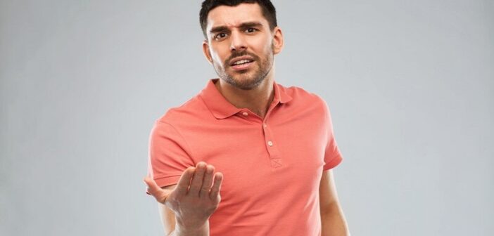 man with argumentative pose and facial expression