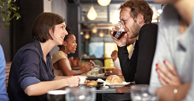 man and woman on first date after meeting online