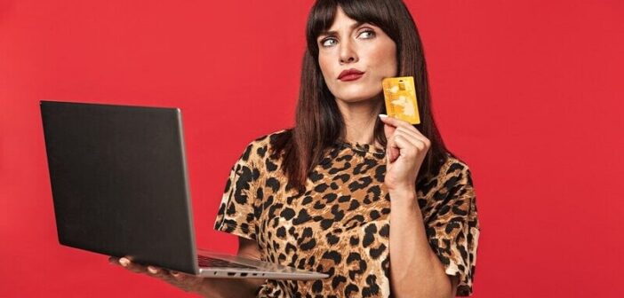 woman thinking about paying for a dating website