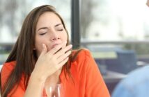 woman yawning on date