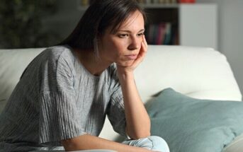 young woman looking bored or depressed
