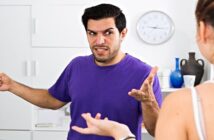 couple arguing - man pointing away illustrating deflection