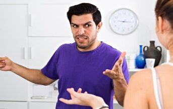 couple arguing - man pointing away illustrating deflection