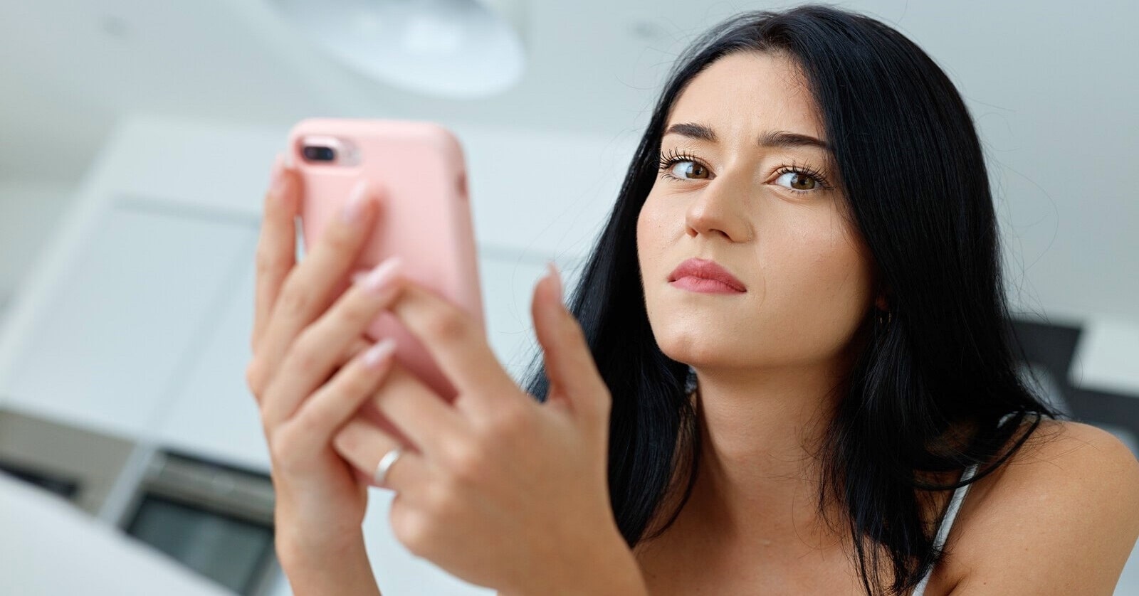 young woman texting a good excuse to get out of something