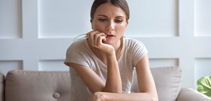 pensive woman wondering how to prepare for a breakup