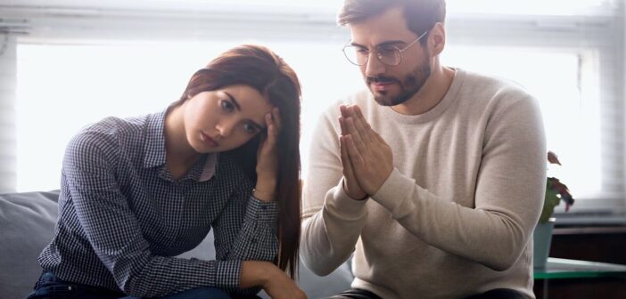 man showing signs he regrets cheating on you by begging for forgiveness