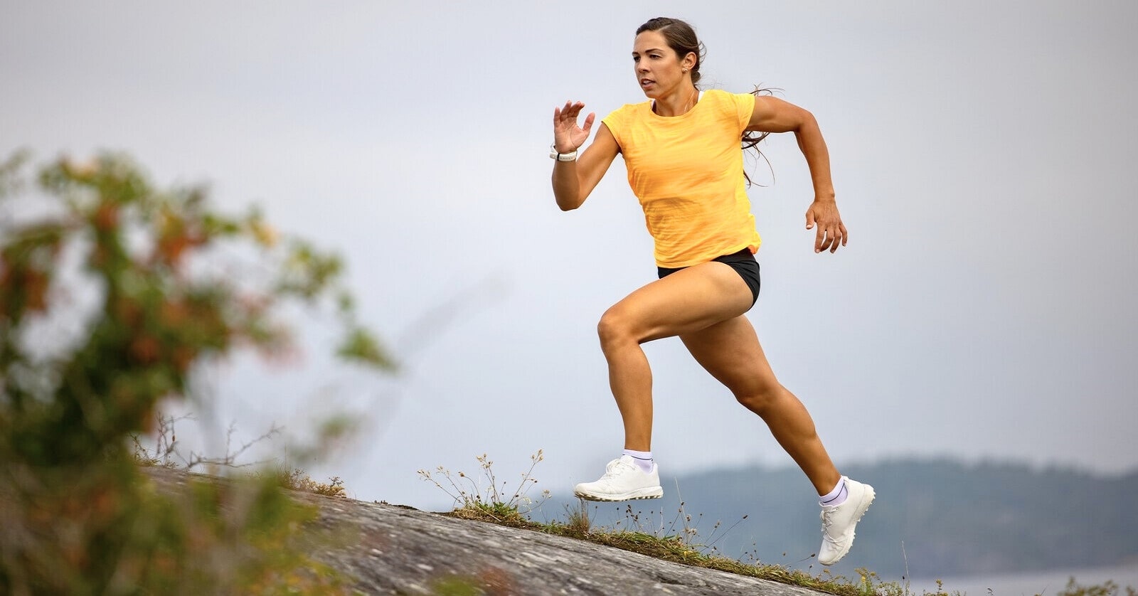 disciplined woman jogger running up hill