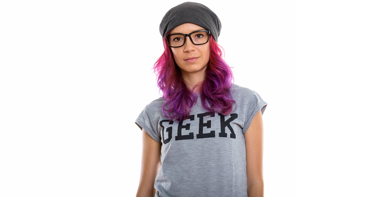 woman with pink hair and "geek" t-shirt wearing glasses and a bandana to highlight the things you may not realize about intelligence