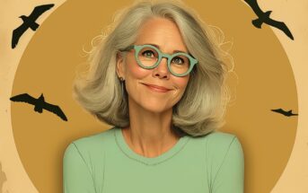Smiling older woman with gray hair and teal glasses, wearing a light green top, stands in front of a yellow background with illustrated black birds flying around her.