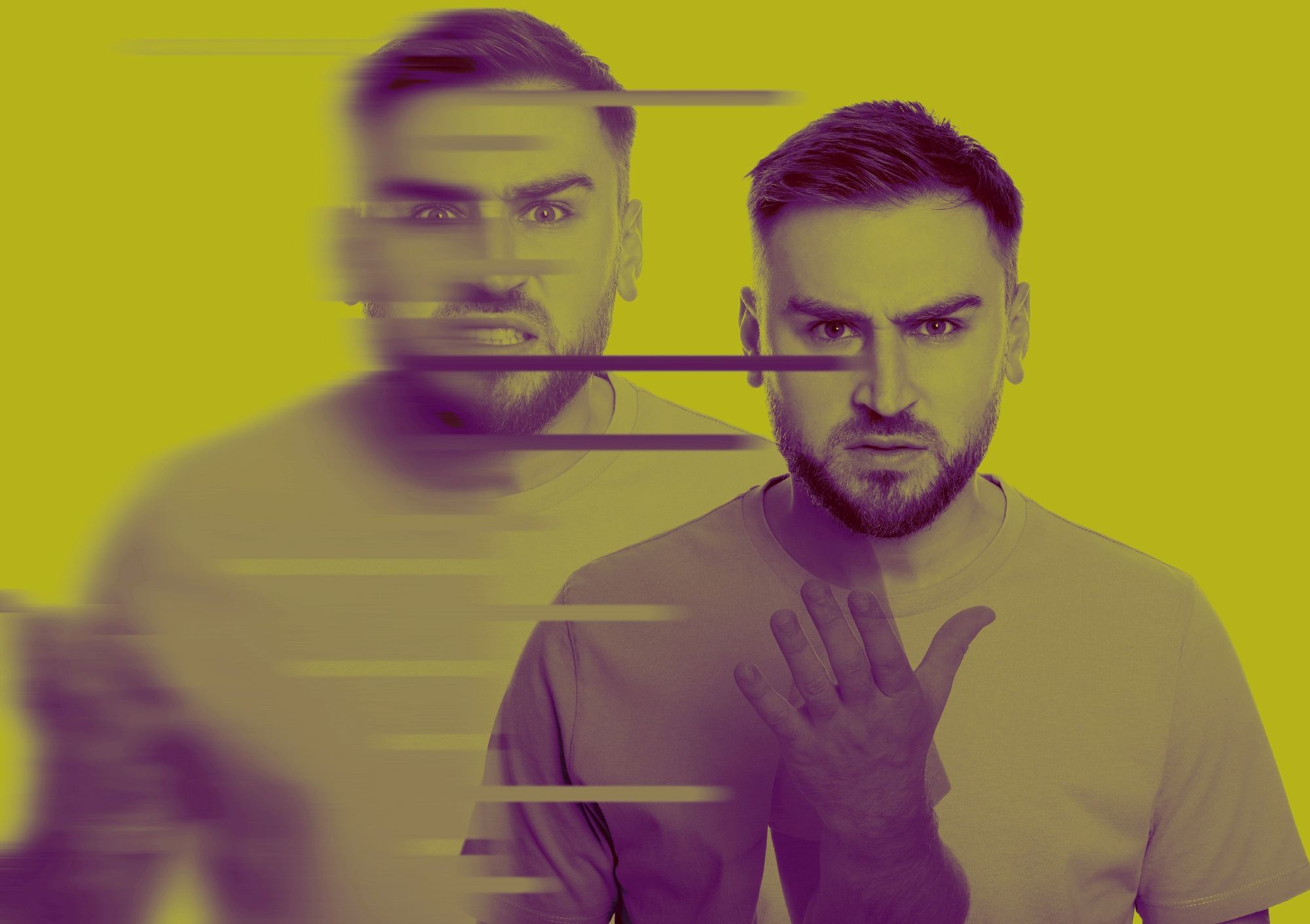 A man with a beard and short hair is standing against a yellow background. His expression shifts from calm to angry, creating a blurred effect with horizontal lines across the image. He raises one hand slightly.