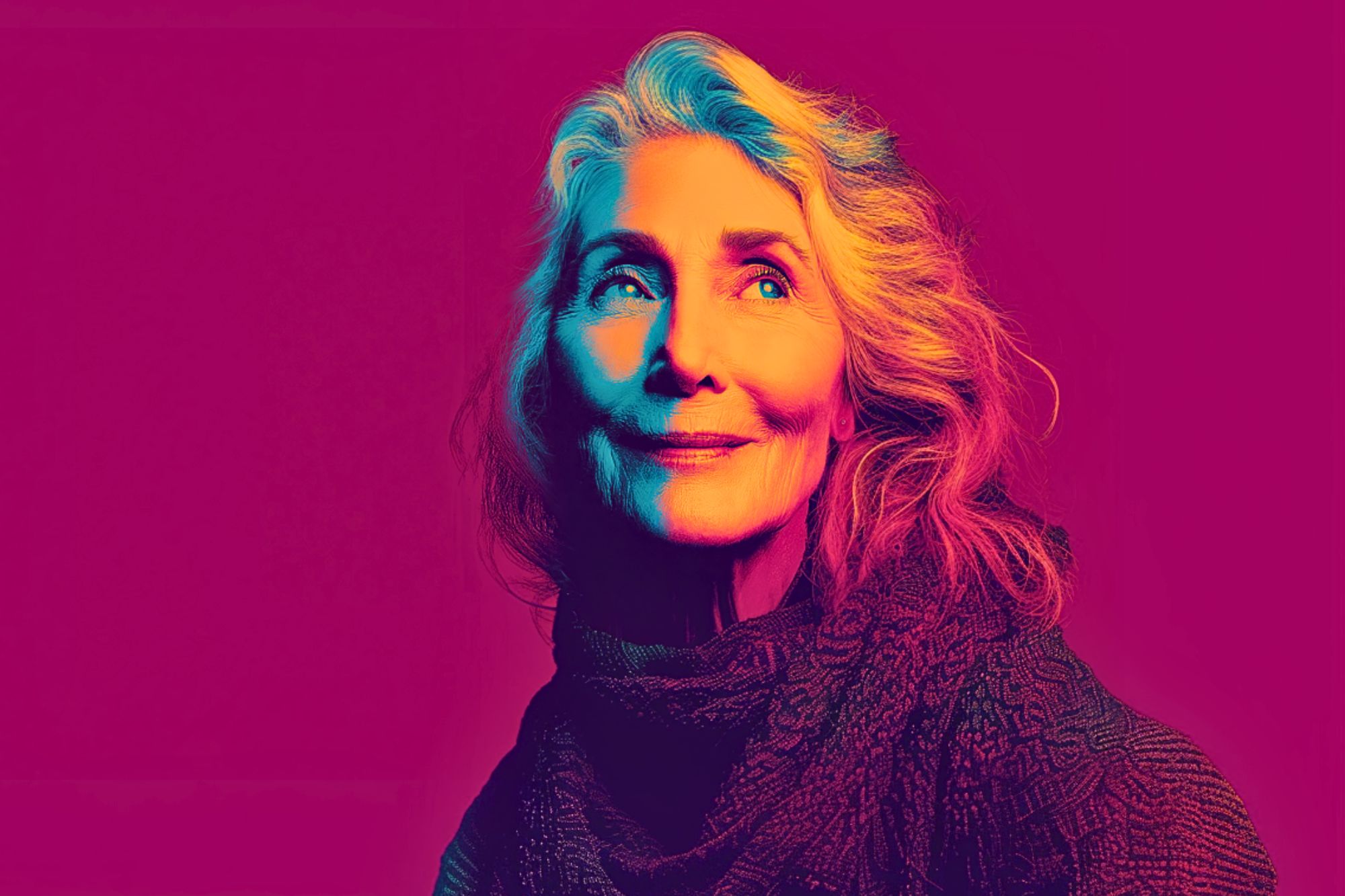 An older woman with long, wavy hair looks up and smiles softly. The image uses bold, colorful lighting and gradients in pink, purple, yellow, and blue tones, creating a dramatic and artistic effect.