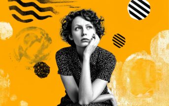 A woman with short curly hair and a polka-dot dress sits with her chin on her hand, looking thoughtful. The background is bright yellow with abstract black and white shapes and patterns.