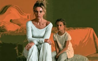 An adult woman and a young girl sit side-by-side in a room with orange and green walls, both looking forward with serious expressions.