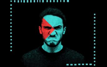 A man with a scrunched, angry facial expression is overlaid with a red and blue geometric filter, framed by blue dotted and solid lines on a black background.