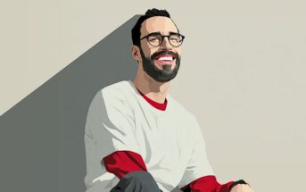 A smiling man with a beard and glasses, wearing a white T-shirt over a red long-sleeve shirt, sits against a pale background with a shadow cast behind him. The image has a digital, illustrated style.